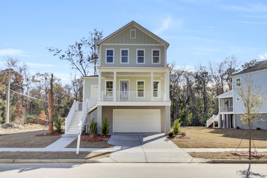 Front exterior of a new home in , Johns Island, SC, highlighting curb appeal (Image 2). Front exterior of a new home in , Johns Island, SC, highlighting curb appeal (Image 2).