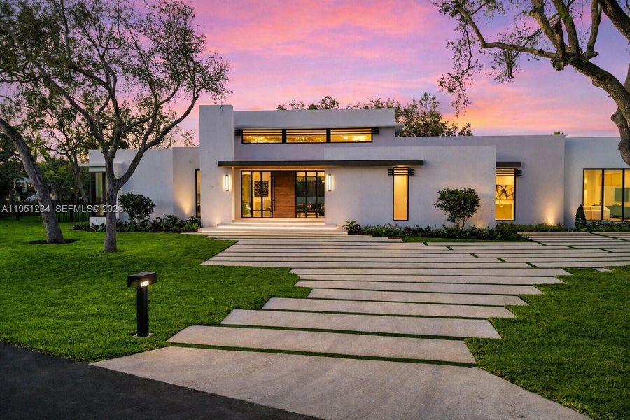 Front exterior of a new home in , Palmetto Bay, FL, highlighting curb appeal (Image 20).