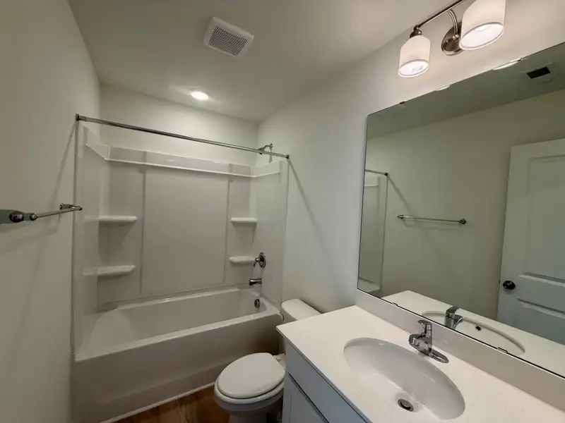 Furnished interior view inside a new home in Bellevue Townhomes, Greenville (Image 5). Furnished interior view inside a new home in Bellevue Townhomes, Greenville (Image 5).