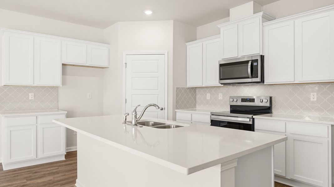 Representative furnished interior of a home built from the Cali by D.R. Horton in Twin Lakes, Hoschton (Image 7).