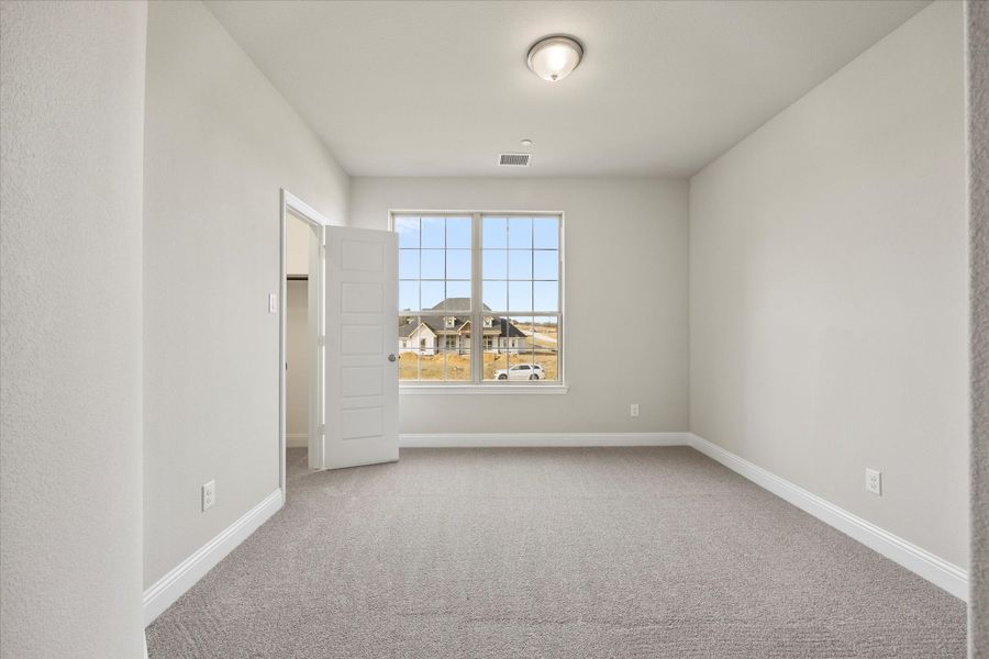Representative unfurnished interior of a home built from the Riverdale by Windsor Homes in Ridge Pointe Estates, McLendon-Chisholm (Image 33).