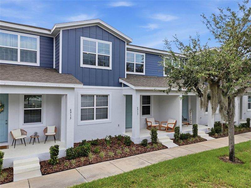 Front exterior of a new home in , Harmony, FL, highlighting curb appeal (Image 1). Front exterior of a new home in , Harmony, FL, highlighting curb appeal (Image 1).
