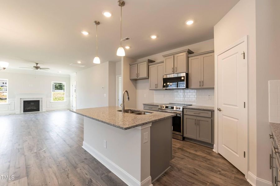 Representative furnished interior of a home built from the 2709 by Adams Homes in The Grove at Ballard, Jacksonville (Image 7).
