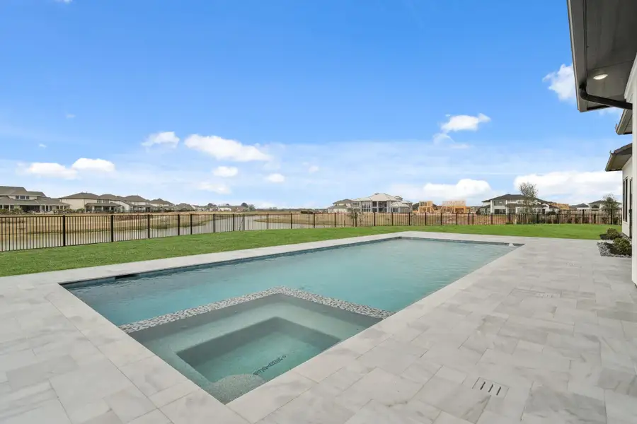 Exterior details and patio area of a home in Bridgeland, Cypress (Image 4).