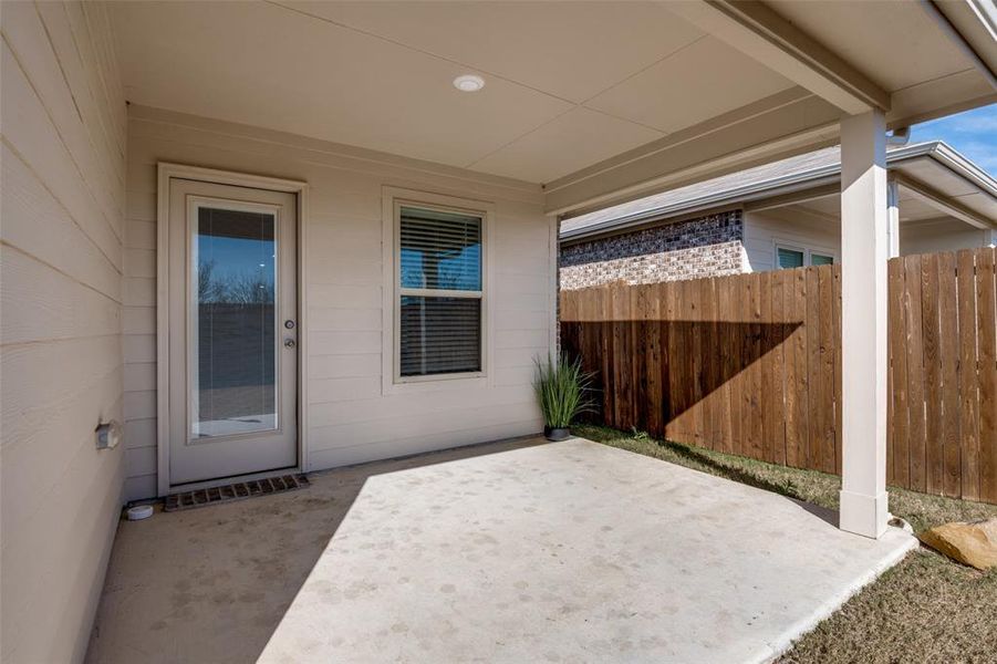 Exterior details and patio area of a home in Wildcat Ranch, Crandall (Image 4).