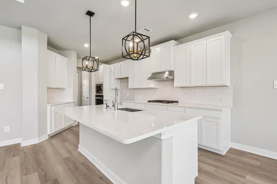 Photo is not of the actual home, but is an inspirational photo of builder’s model home and may depict options, furnishings, and/or decorator features that are not included