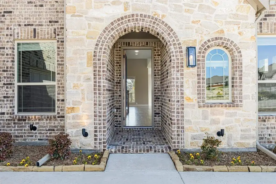 Exterior details and patio area of a home in Timberbrook, Justin (Image 4).