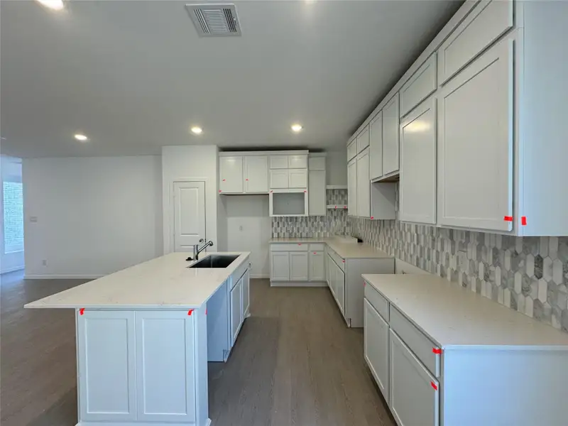 **Photos for illustration of floor plan and elevation. Not actual home**