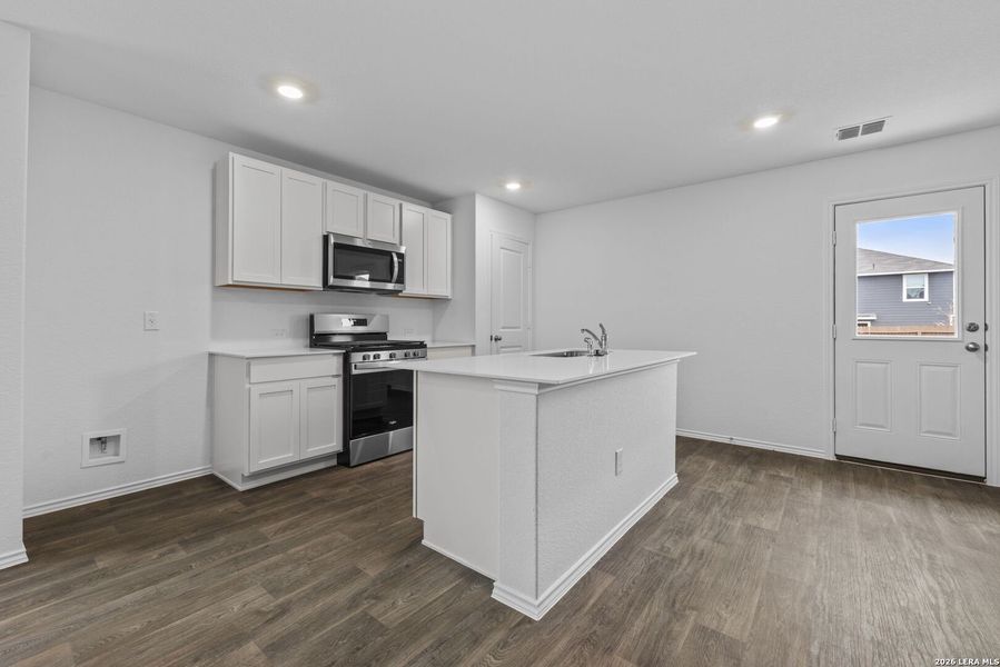 Furnished interior view inside a new home in Avenida, Converse (Image 8).