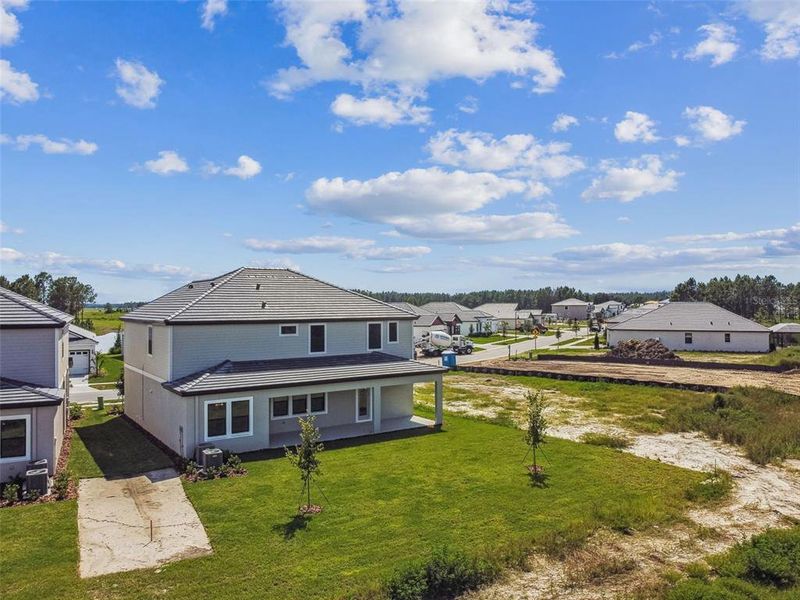 Exterior details and patio area of a home in Tamarack at Two Rivers, Zephyrhills (Image 2). Exterior details and patio area of a home in Tamarack at Two Rivers, Zephyrhills (Image 2).