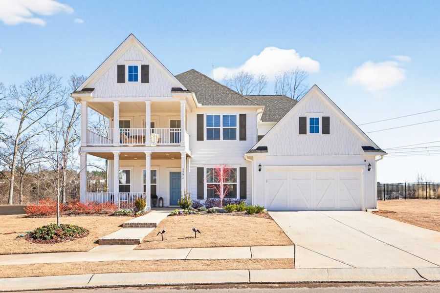 Front exterior of a new home in Reunion, Flowery Branch, GA, highlighting curb appeal (Image 25).