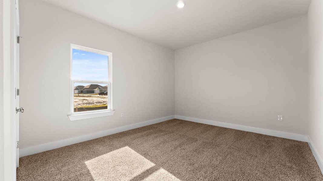 Representative unfurnished interior of a home built from the The Mckenzie by D.R. Horton in Liberty, Panama City (Image 32).