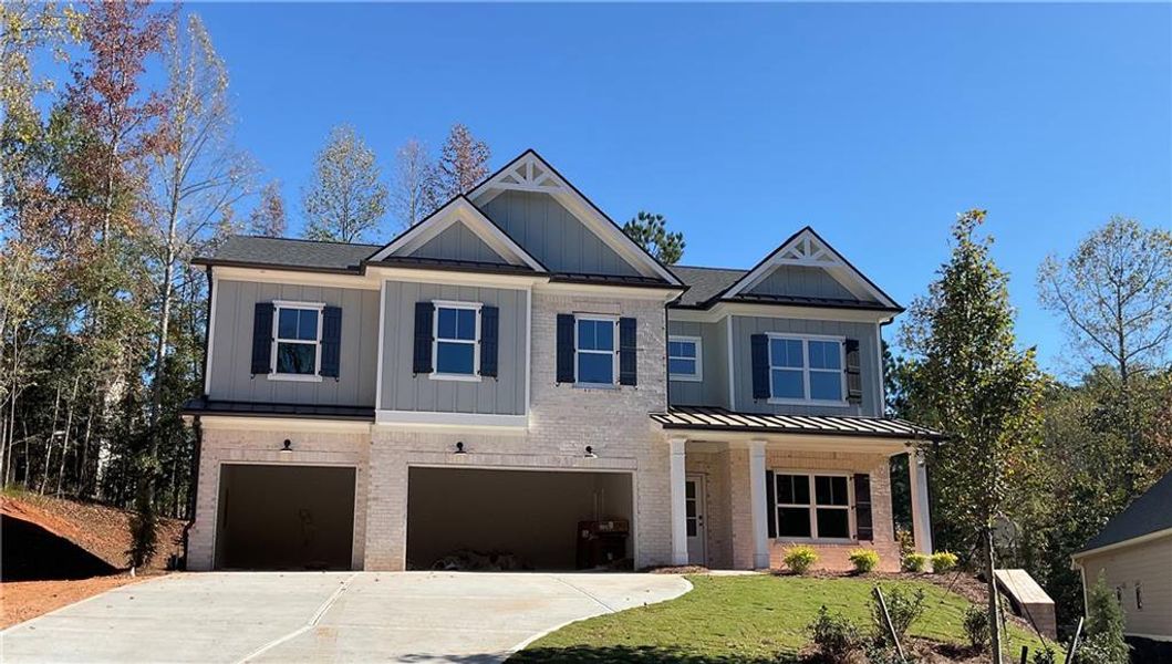 Front exterior of a new home in , Jefferson, GA, highlighting curb appeal (Image 1).