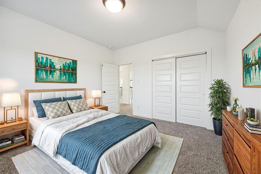 Step into this bright and airy bedroom, where high ceilings and large windows amplify the space, making it the perfect canvas for your personal style and comfort.