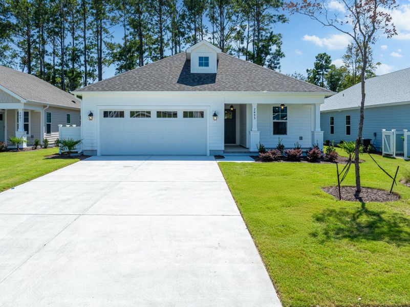 Representative exterior photo of a completed home built from the Sand Dune by Bill Clark Homes in Osprey Landing, Southport, NC (Image 22).