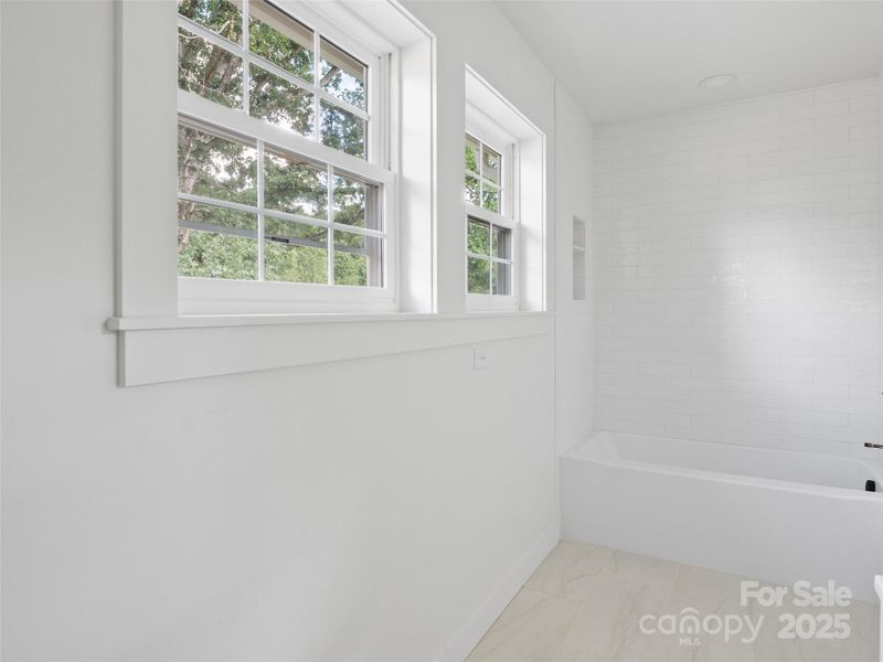 Furnished interior view inside a new home in , Waynesville (Image 9).