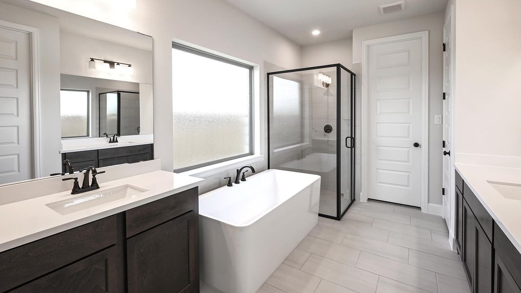 Furnished interior view inside a new home in 6 Creeks, Kyle (Image 11).
