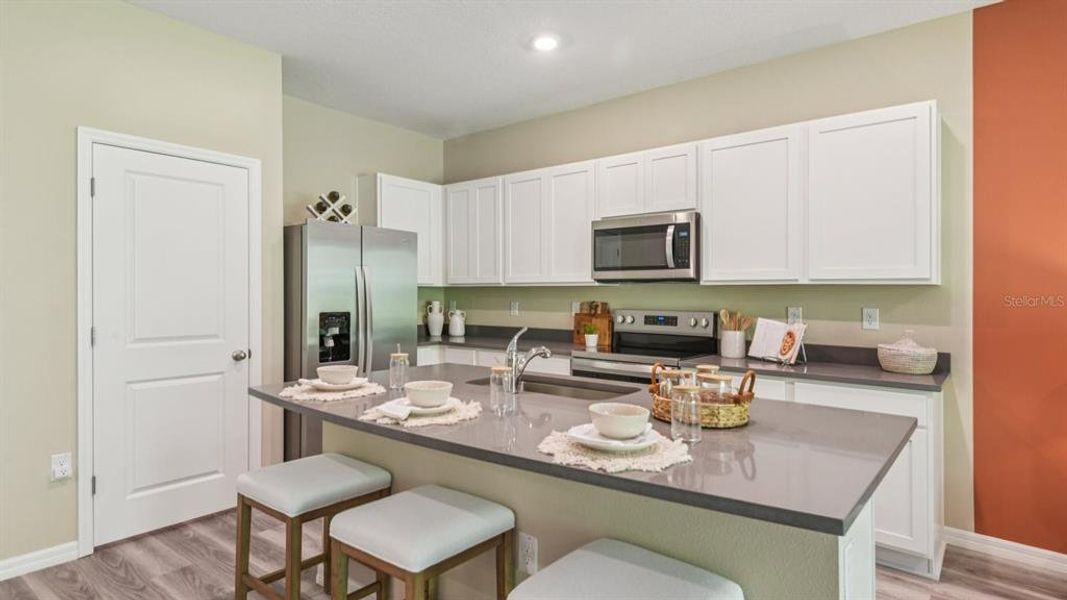 Furnished interior view inside a new home in Meadow Ridge at Epperson, Wesley Chapel (Image 8).