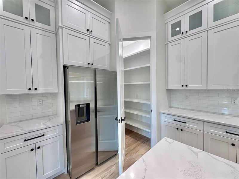 Furnished interior view inside a new home in , North Port (Image 6).