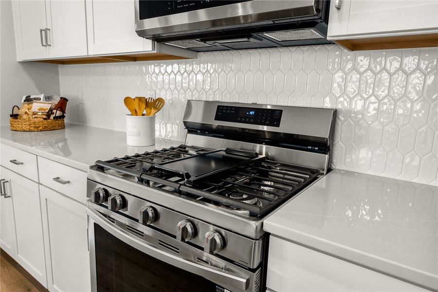 Culinary delights await with this kitchen's stainl Culinary delights await with this kitchen's stainl