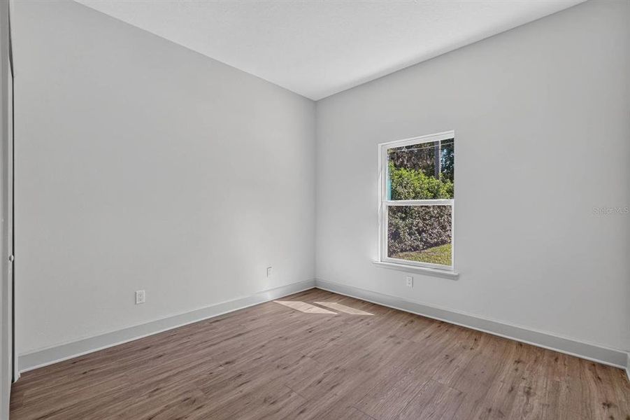 Spacious, unfurnished interior of a new home in , New Smyrna Beach (Image 27).