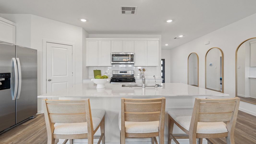Representative furnished interior of a home built from the Rosemont by D.R. Horton in Sunterra Lakes, Brookshire (Image 12).