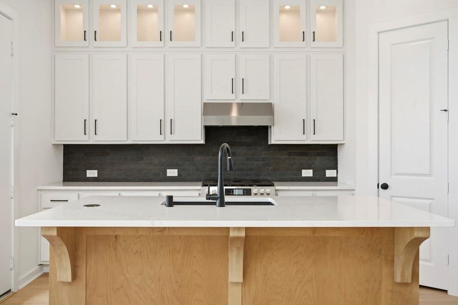 Furnished interior view inside a new home in Bridgeland, Cypress (Image 7).