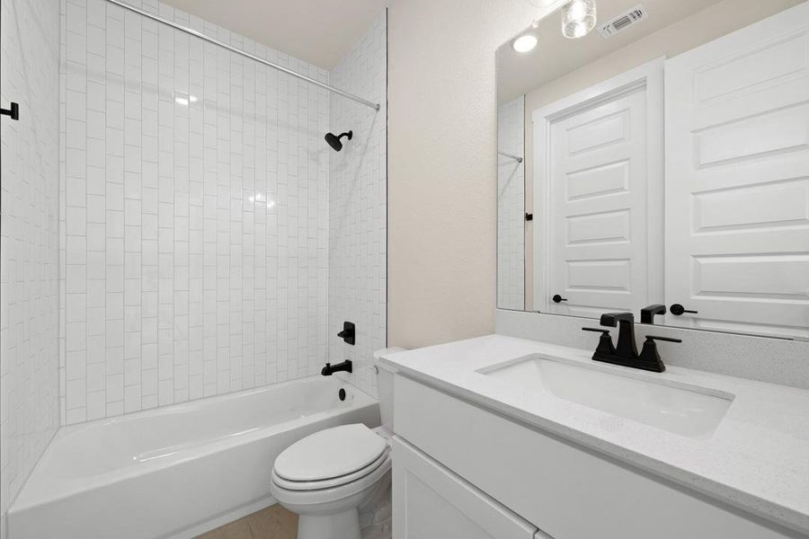 Furnished interior view inside a new home in Terrace Collection At Turner's Crossing, Buda (Image 9).