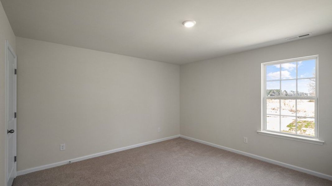 Spacious, unfurnished interior of a new home in Madeline Farm, New Bern (Image 27).