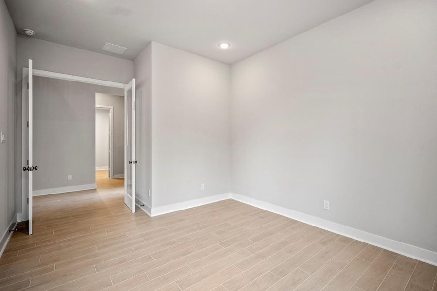 Spacious, unfurnished interior of a new home in ARTAVIA 55' Lots, Conroe (Image 47).