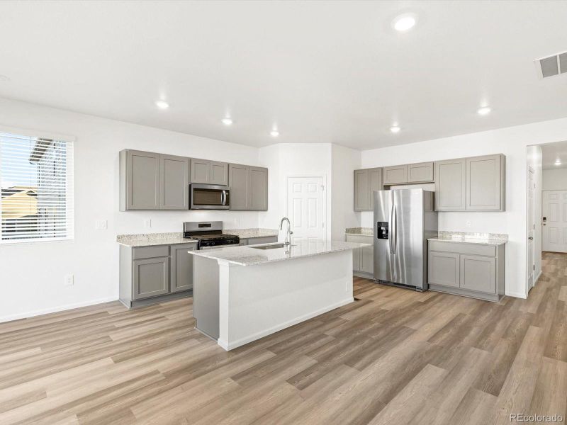 Furnished interior view inside a new home in Poudre Heights: The Lakes Collection, Windsor (Image 11). Furnished interior view inside a new home in Poudre Heights: The Lakes Collection, Windsor (Image 11).