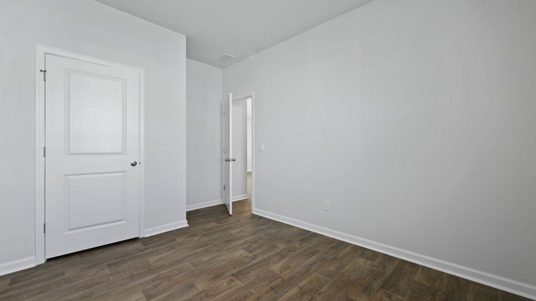Representative unfurnished interior of a home built from the DOWNING by D.R. Horton in The Oaks at Center Station, Hollywood (Image 18).