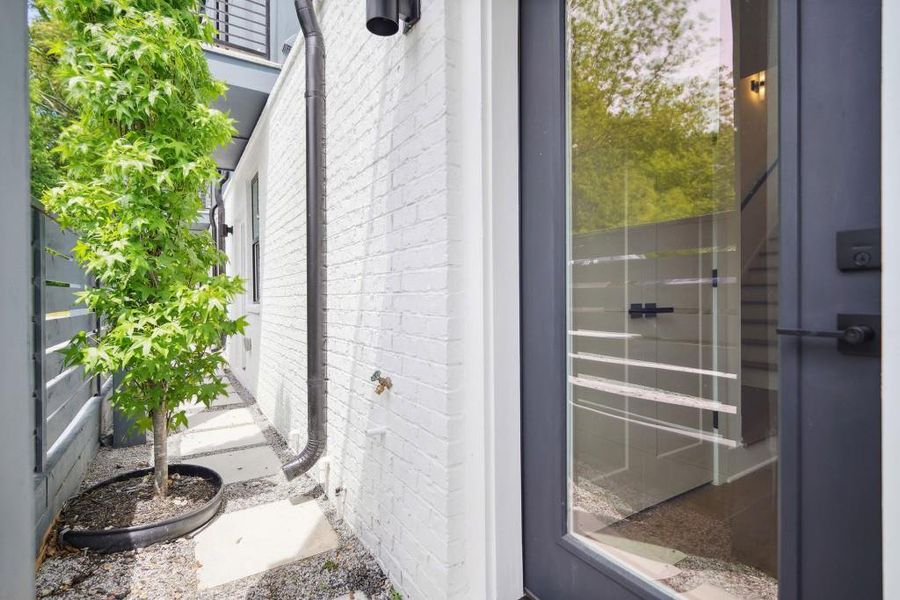 Exterior details and patio area of a home in Arlo Modern, Atlanta (Image 26).