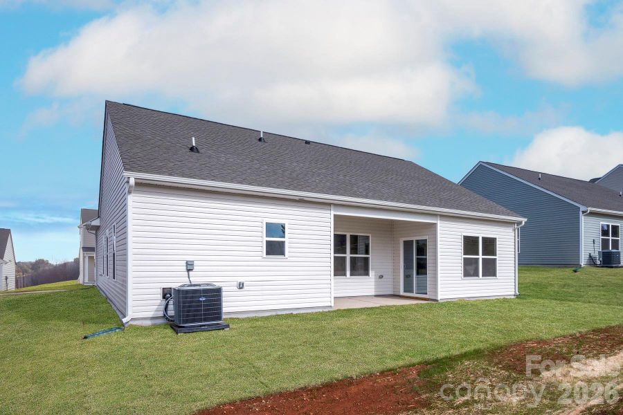 Exterior details and patio area of a home in Village at Granite, Granite Quarry (Image 3).