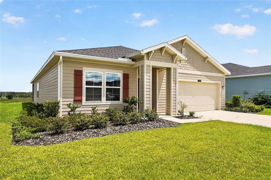 Front exterior of a new home in , Alachua, FL, highlighting curb appeal (Image 27). Front exterior of a new home in , Alachua, FL, highlighting curb appeal (Image 27).