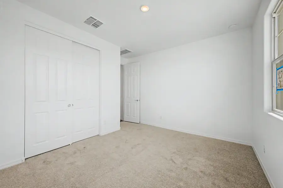 Spacious, unfurnished interior of a new home in Tyler Ranch, Buckeye (Image 13). Spacious, unfurnished interior of a new home in Tyler Ranch, Buckeye (Image 13).