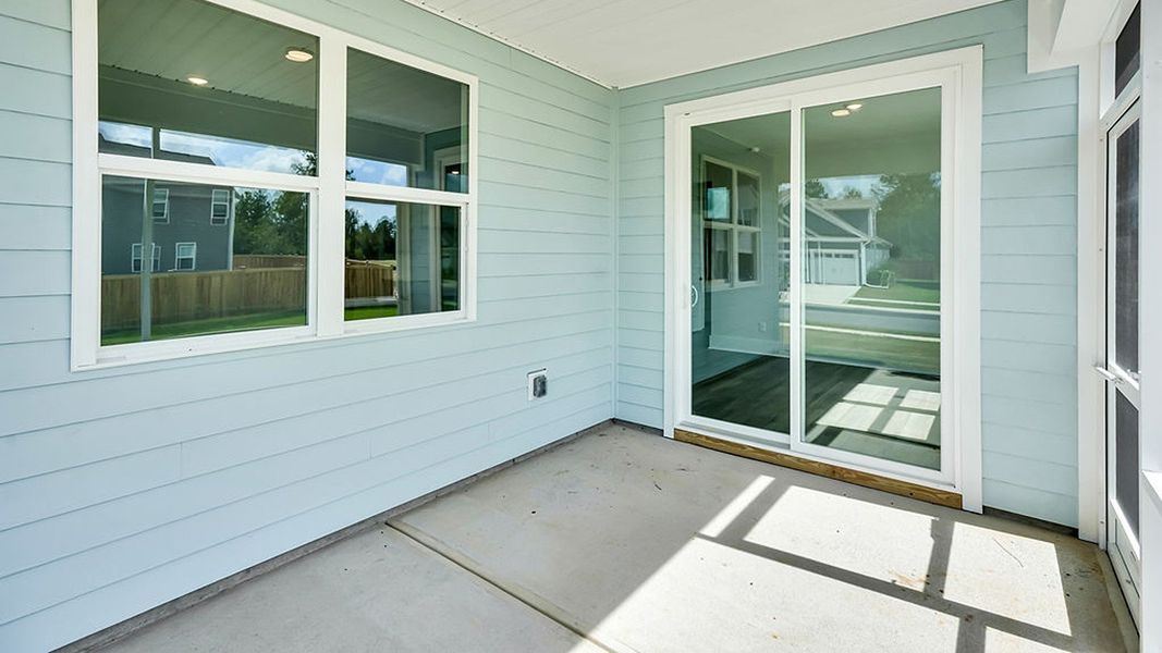 Exterior details and patio area of a home in The Haven at Indigo Preserve, Leland (Image 3).