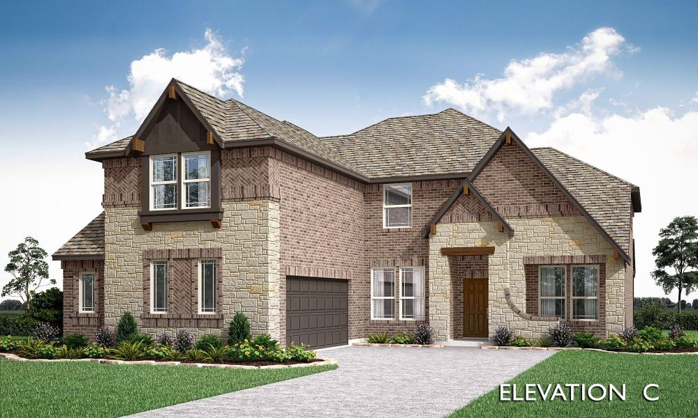 Two-story brick and stone home with two-car garage, wood front door, and landscaped yard, Elevation C Two-story brick and stone home with two-car garage, wood front door, and landscaped yard, Elevation C