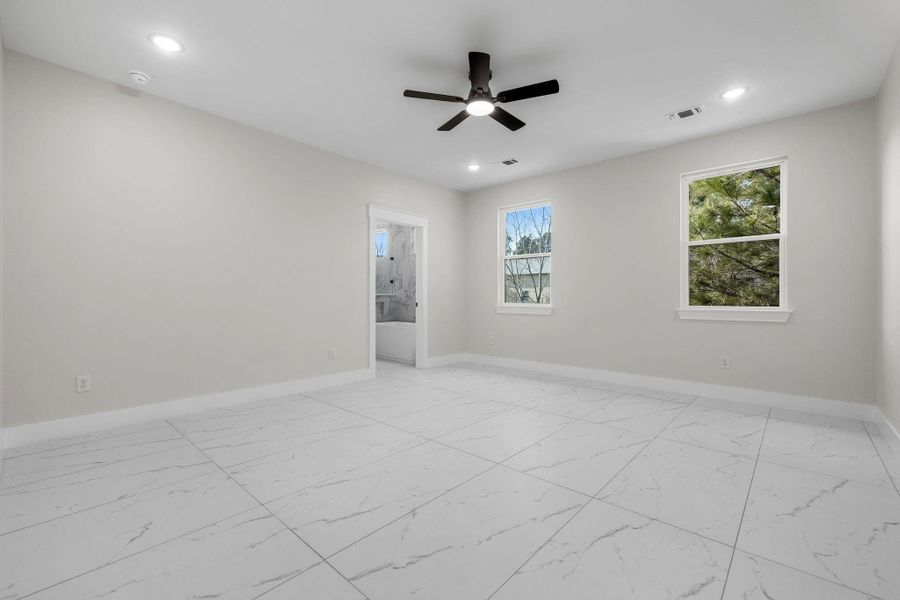 Unfurnished room with ceiling fan