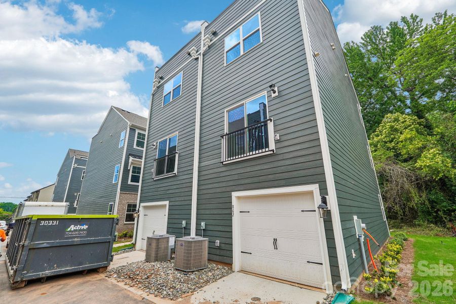 Exterior details and patio area of a home in Anderson Street Townhomes, Charlotte (Image 27).
