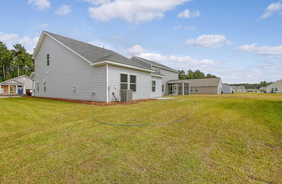 Exterior details and patio area of a home in Watson Hill, Summerville (Image 22).