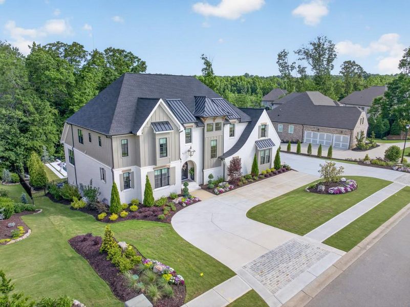 Front exterior of a new home in , Braselton, GA, highlighting curb appeal (Image 29).