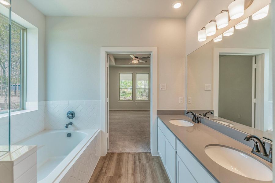 Furnished interior view inside a new home in Deer Pines, Conroe (Image 16).