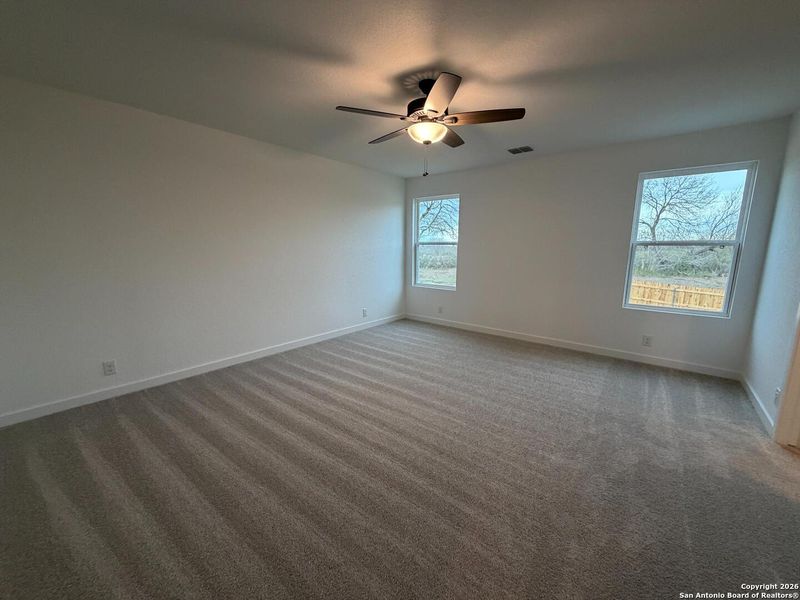 Spacious, unfurnished interior of a new home in The Preserve at the Wilder, Adkins (Image 27).