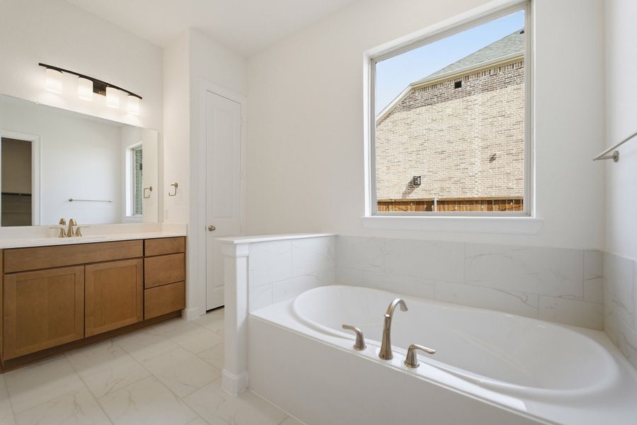 Furnished interior view inside a new home in Sonoma Verde, Heath (Image 13).