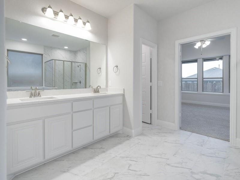 Bathroom with vanity and walk in shower