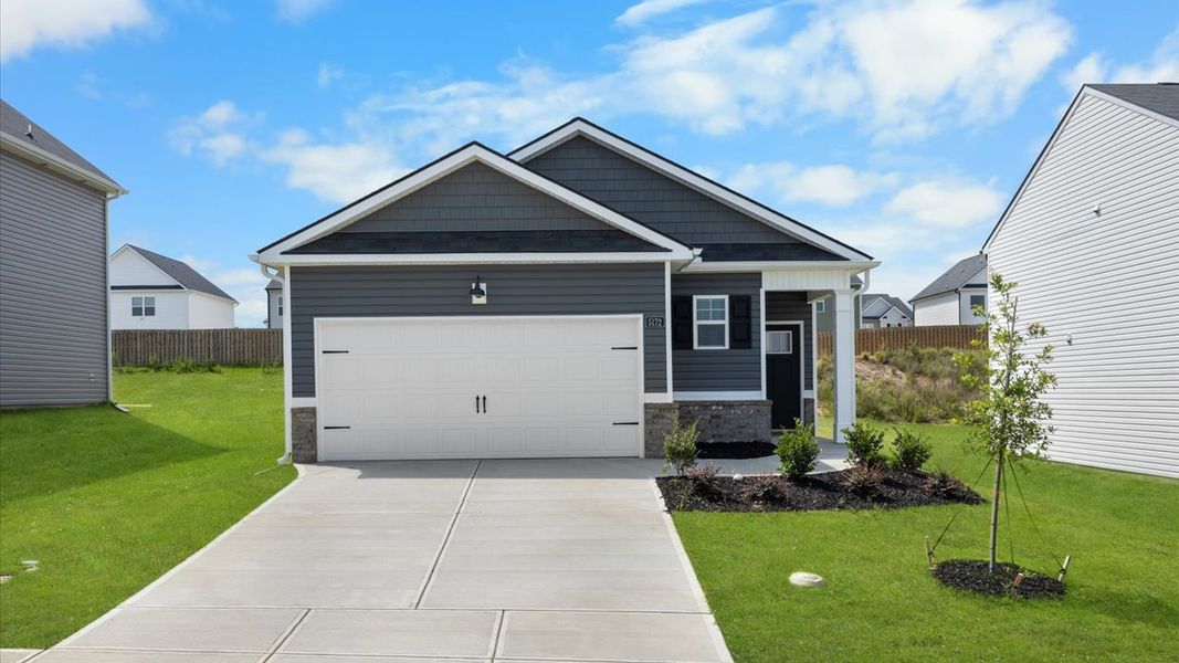 Front exterior of a new home in Captain's Corner, Grovetown, GA, highlighting curb appeal (Image 1). Front exterior of a new home in Captain's Corner, Grovetown, GA, highlighting curb appeal (Image 1).