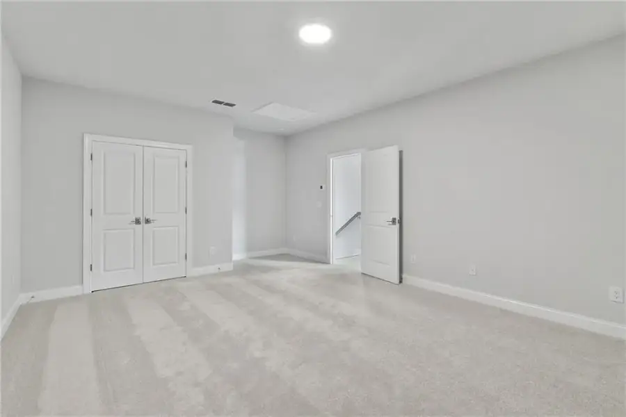 Spacious, unfurnished interior of a new home in Promenade at Sawnee Village, Cumming (Image 19).