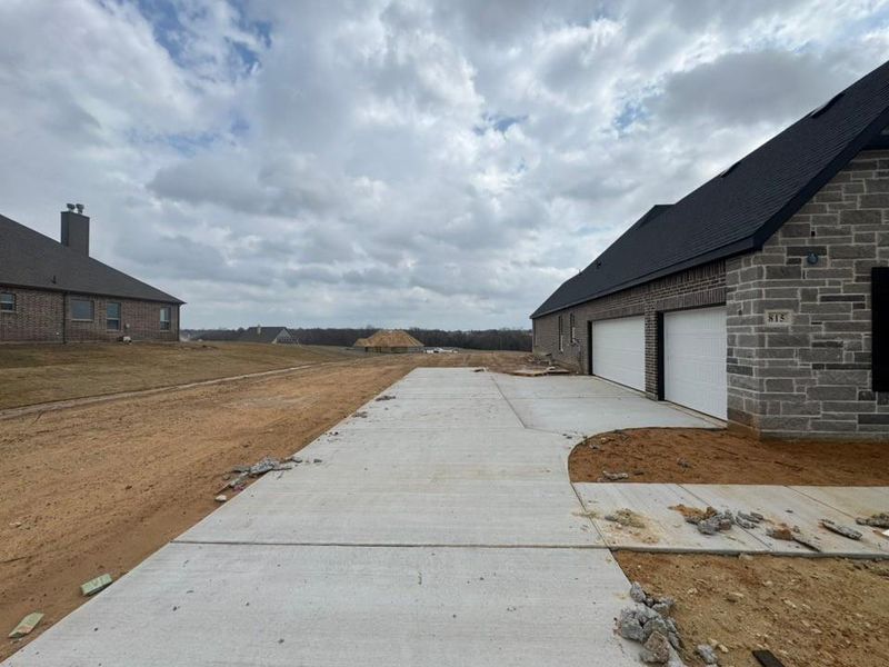In-progress construction of a new home in Creekview Addition, Van Alstyne, TX (Image 14).