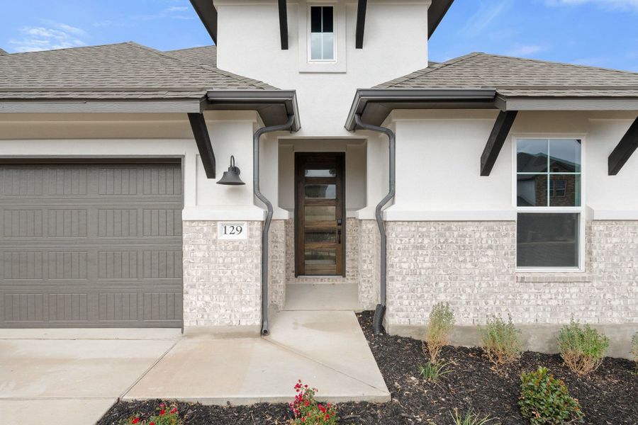 Exterior details and patio area of a home in Lariat, Liberty Hill (Image 3). Exterior details and patio area of a home in Lariat, Liberty Hill (Image 3).